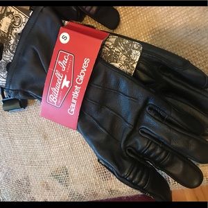 Black leather Biltwell motorcycle riding gloves